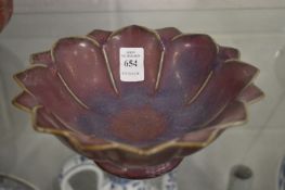 A Chinese Song style glazed lotus form bowl.