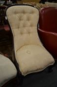 A Victorian mahogany framed bedroom chair.