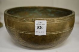 An Eastern bronze singing bowl.