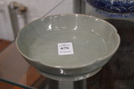 A small Chinese celadon glazed lotus form brush washer.