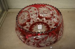 A ruby tinted cut glass bowl.