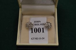 A good pair of gold and diamond cluster ear studs.