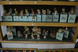 A large collection of Pen Delfin figures, most with original boxes together with larger display