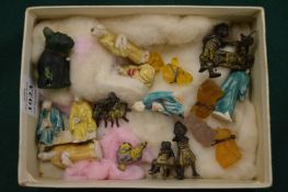 Miniature glass animals and other items.