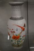 A Chinese Republican style porcelain vase painted with birds on a branch.