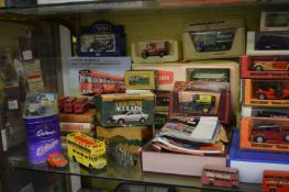 A large quantity of die-cast buses and other items, some boxed.