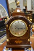 A good Georgian style mahogany cased bracket clock with inlaid decoration, the eight day movement