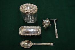 A silver mounted cut glass dressing table jars and other items.
