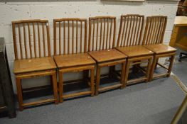 Five Chinese soft wood side chairs.