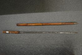 An old bamboo sword cane.