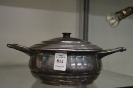 W.A.S Benson, a silver plated twin handled small tureen and cover.
