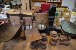 Old weighing scales and weights.