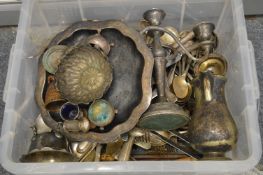 A box of plated flatware and other items.