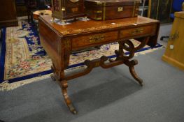A very good Regency rosewood and brass inlaid sofa table.