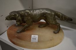 An alabaster pin tray mounted with a model of a setter.