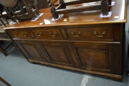 A good reproduction mahogany sideboard/dresser.