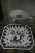 A Chinese blue and white pedestal dish and another dish.