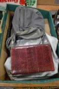 A quantity of ladies handbags.
