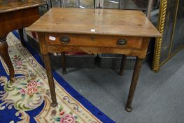 A 19th century oak side table.