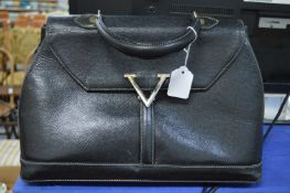 A Valentino black leather handbag.