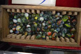 A quantity of marbles.