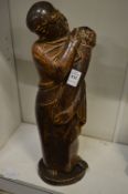 A salt glazed earthenware stylised figure of Ruth.