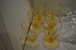 A set of six White Friars golden amber liqueur glasses.