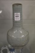 A Chinese crackle glaze celadon bottle vase.