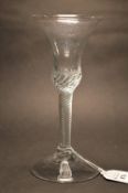 A George III wine glass with air twist stem and trumpet shaped bowl (small rim chip).