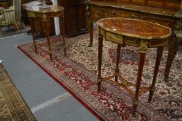 A good pair of French king wood, marquetry and ormolu mounted occasional tables.