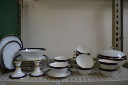 Bavarian part dinner service, white ground with blue and gilt rims.