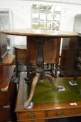 A 19th century mahogany tilt-top tripod table.