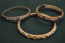 Three decorative bangles.