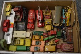 A small group of die-cast cars, vans and accessories.