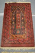 A small Persian rug, 132cm x 79cm.