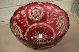 A large ruby tinted cut glass bowl (rim chip).