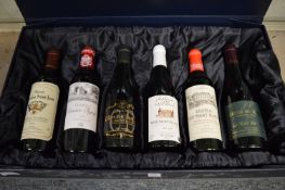 A cased set of six half bottles of red wine.