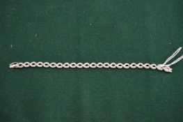 An 18ct white gold and diamond bracelet.