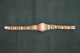 A bracelet mounted with a cameo.