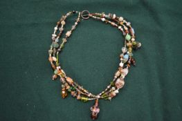 Decorative bead necklace.