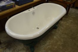 A Victorian style cast iron bath.