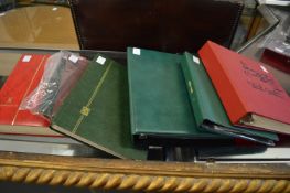 A quantity of albums containing numerous stamps and first day covers.