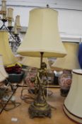 An ormolu table lamp.