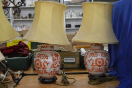 A pair of Chinese style table lamps.