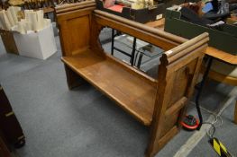 A Victorian oak pine pew.