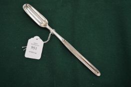 A Georgian silver marrow scoop.