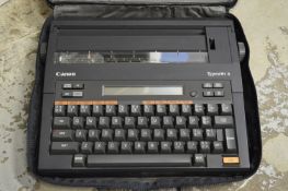 Portable typewriter.