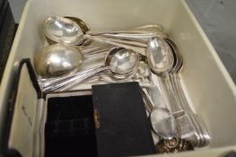 A small group of plated flatware.