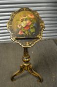 A very good Victorian papier mache adjustable stand with gilded and painted decoration.