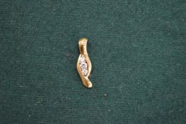 An 18ct gold and diamond pendant.